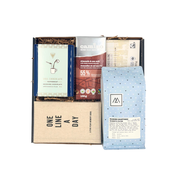 This gift box includes gourmet coffee beans, one line a day journal, peppermint drinking chocolate and two organic chocolate bars.