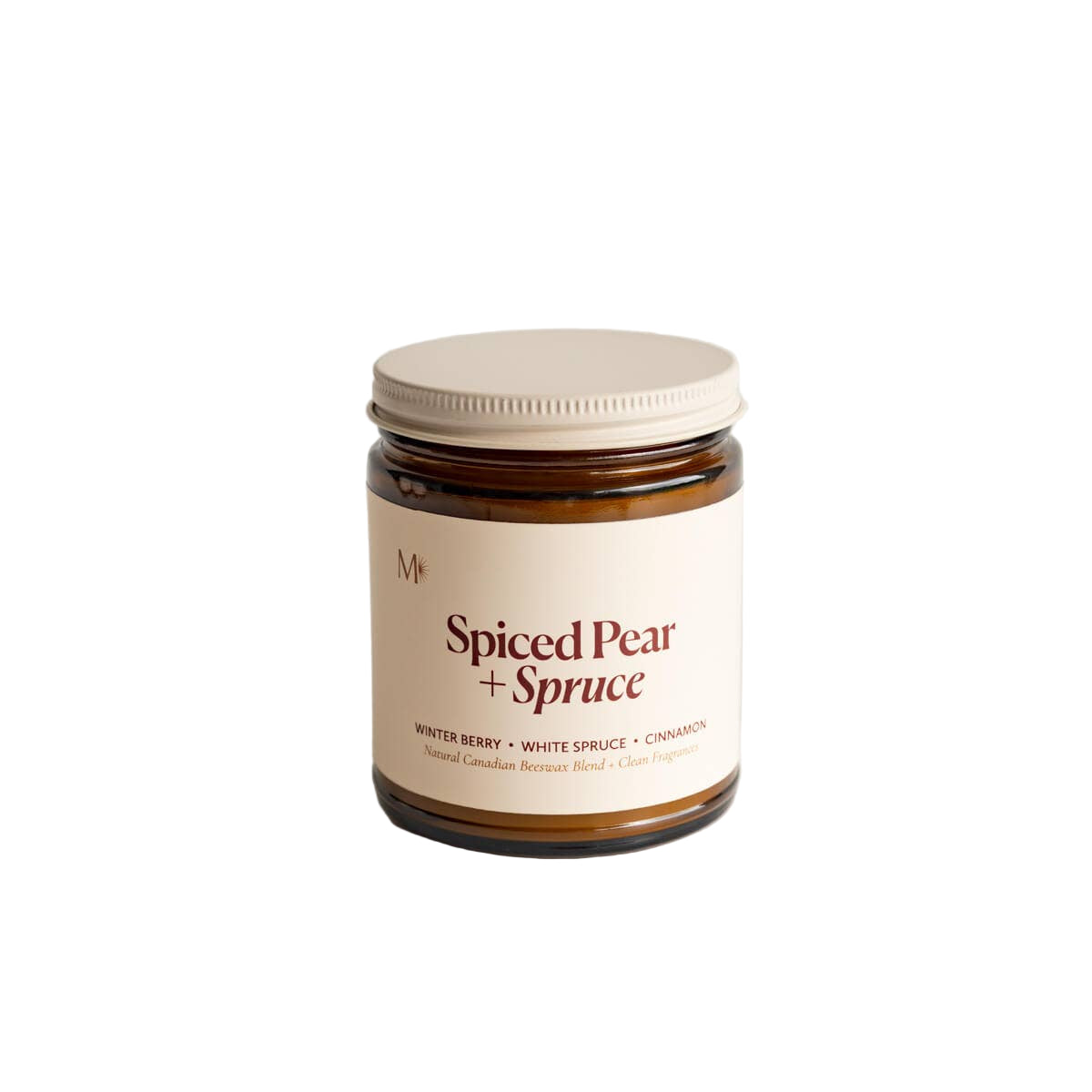 Jar of 'Spiced Pear + Spruce' candle on a light gray background